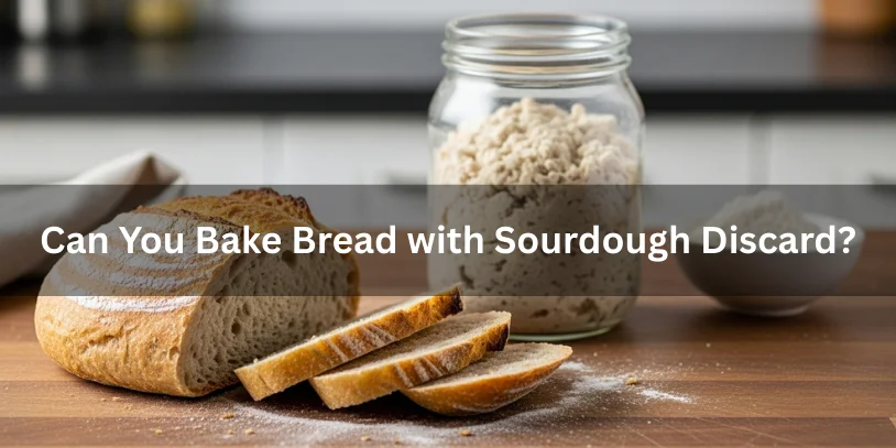 A sliced loaf made with sourdough discard showing a tighter crumb, with sourdough discard in a jar nearby.-difference between sourdough starter and discard 