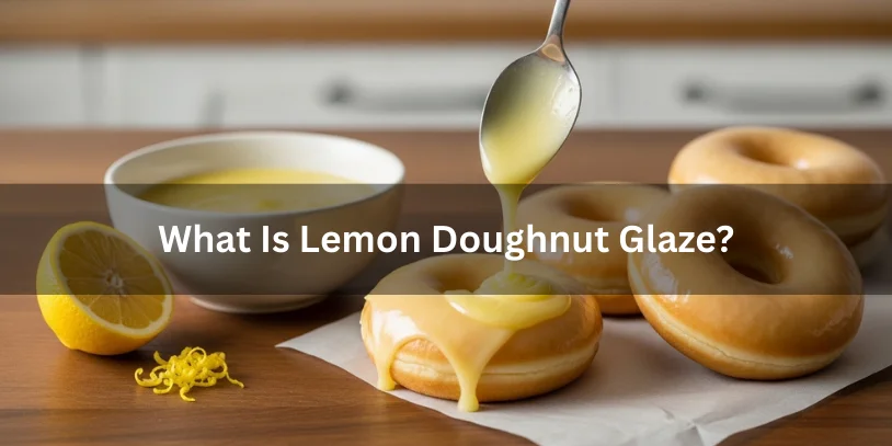 Glossy lemon glaze in a bowl being drizzled over plain doughnuts, with lemon wedge and zest for context.-lemon doughnut glaze 