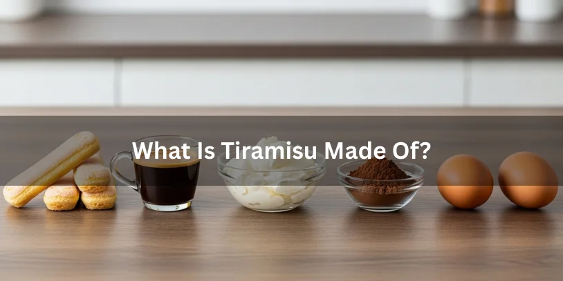 Mascarpone, ladyfinger biscuits, espresso, cocoa powder, and eggs arranged on a countertop, showing what tiramisu is made of.-pregnancy and tiramisu 