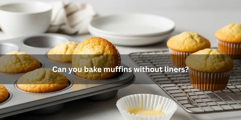 Freshly baked muffins released cleanly from a greased muffin tin without paper liners, illustrating that muffins can be baked without liners under soft natural lighting.-why do my muffins stick to the paper liners 